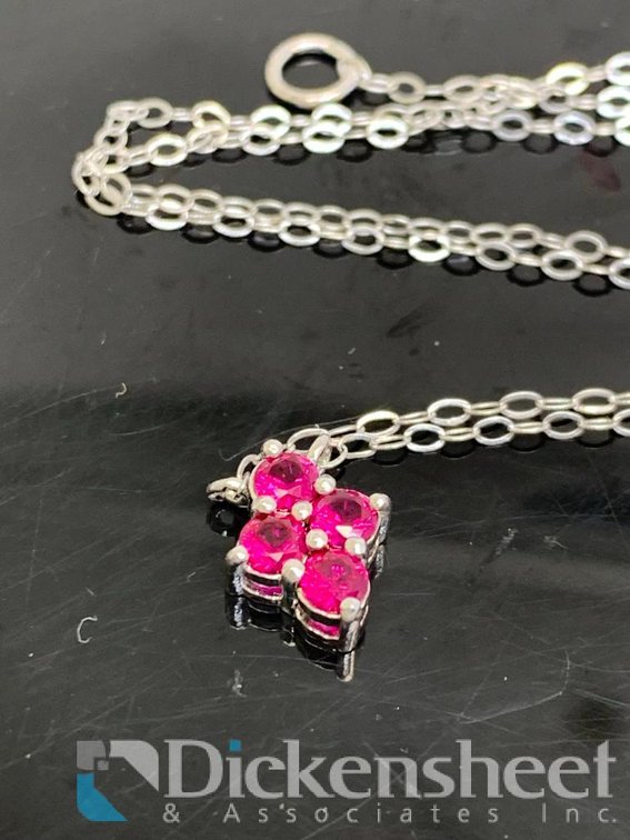 Sterling Silver Pendant With Red Stones