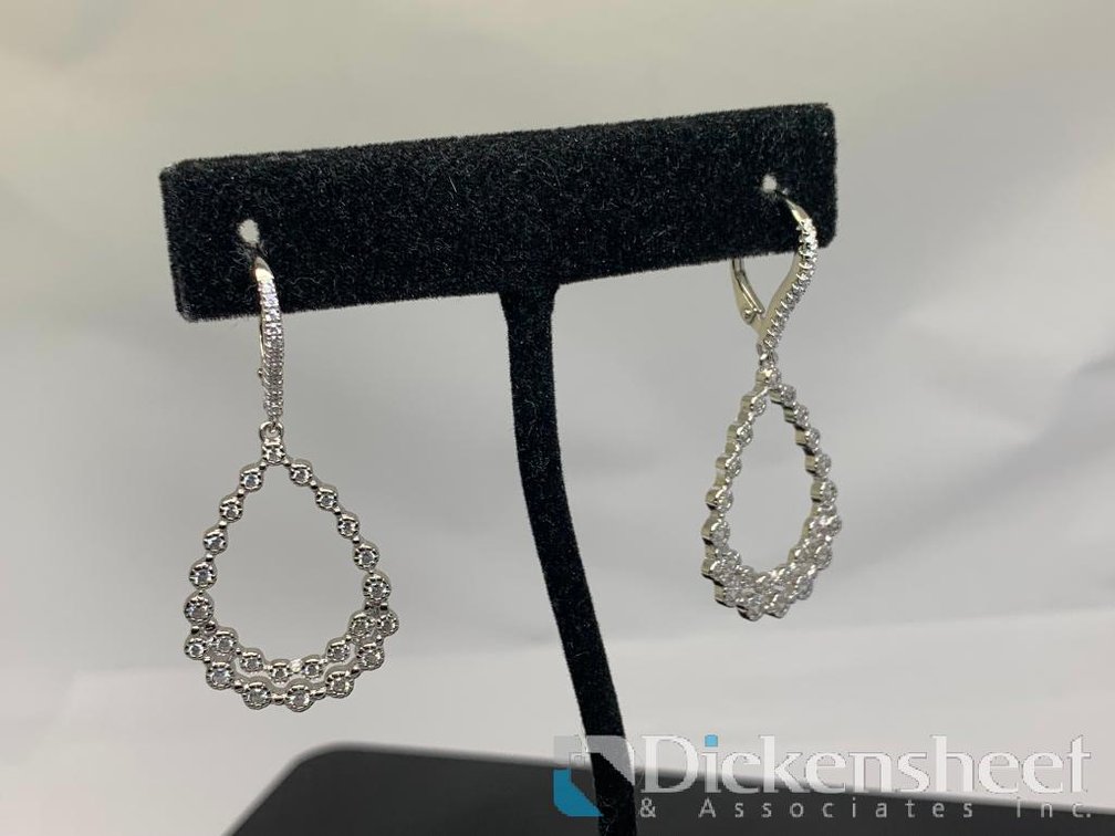Silver Tone Dangle Earrings With Clear Stones