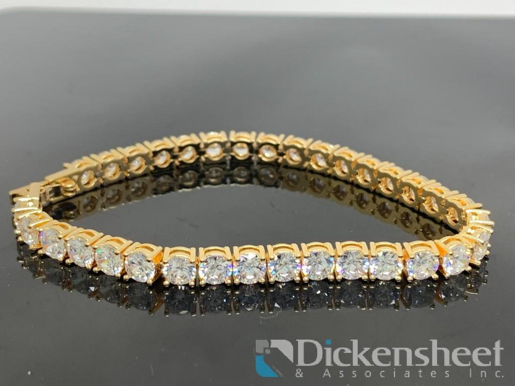 Gold Tone Tennis Bracelet With Clear Stones