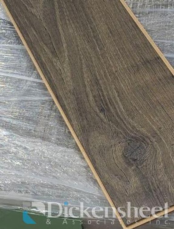 556.74 SQ FT. OF MOHAWK LAMINATE PLANK FLOORING- COLOR NUTMEG