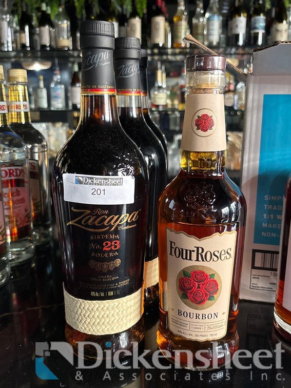 (4) BOTTLES OF MIXED LIQUOR