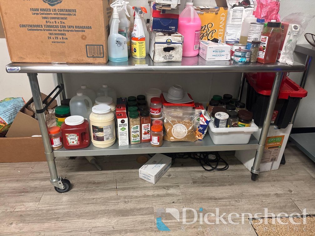 STAINLESS STEEL TABLE ON CASTERS with lower shelf