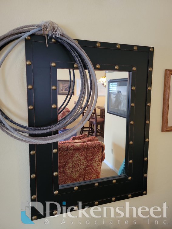 FRAMED MIRROR WITH DECORATIVE LASSO