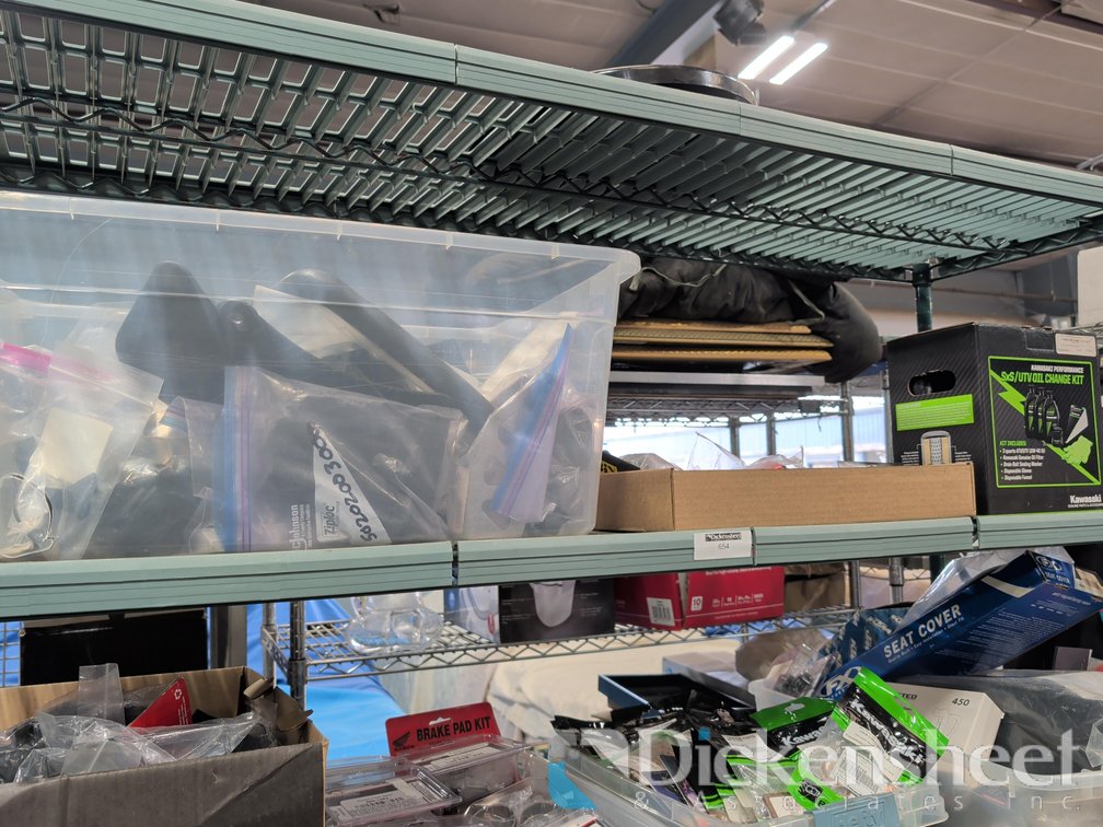 SHELF WITH ACCESSORIES, PARTS AND OIL CHANGE KIT