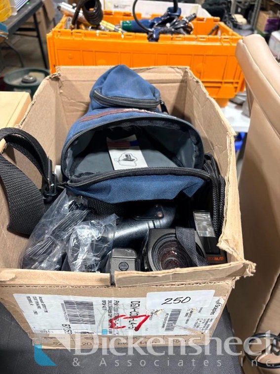 Box of Cameras and Lenses