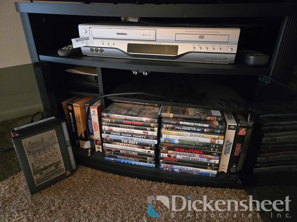 TOSHIBA DVD PLAYER AND ASSORTED DVD LOT