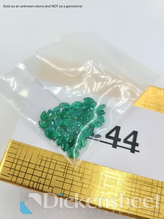 Unknown 7.82ct Green Stones