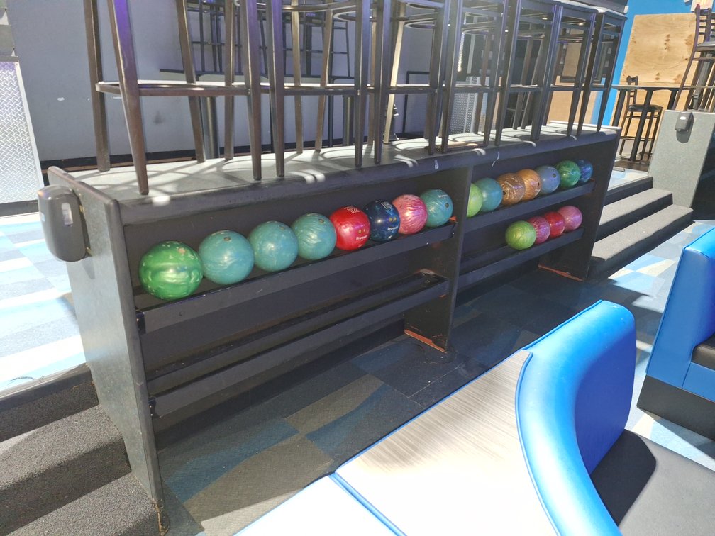 Bowling Balls and Storage Racks