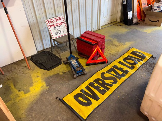 Image for (12) Portable Reflective Safety Triangles w/ Plastic Storage Cases, (1) Oversize Load Banner, (1) Floor Jack w/Floor Mats