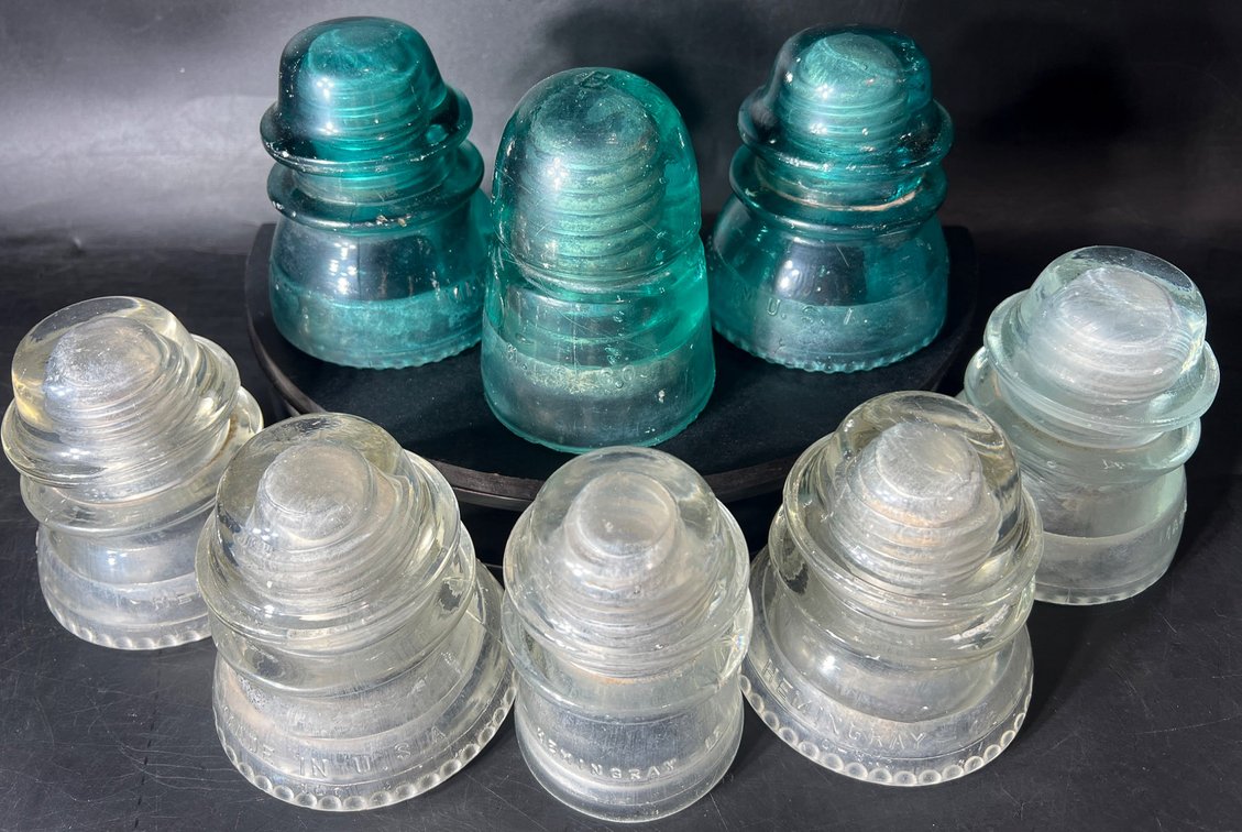 Seven Hemingray Glass Insulators, Aqua and Clear