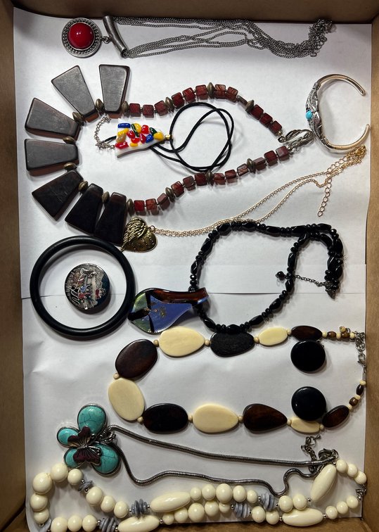 Jewelry Collection Featuring Necklaces, Bracelets, and Brooches