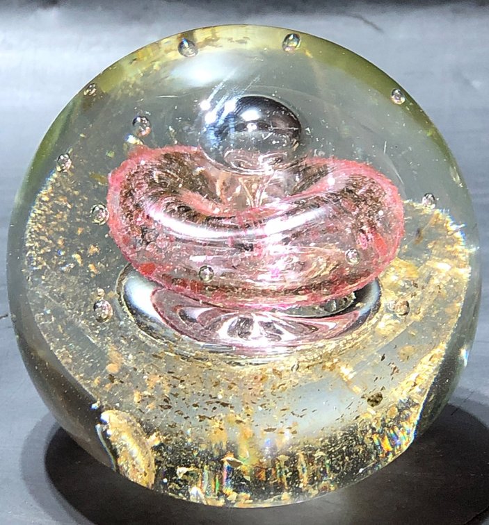 Glass Paperweight with Pink and Gold Swirl Design