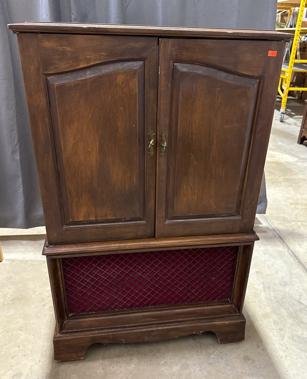 Vintage TV Cabinet with Red Grille Accent Measuring 25.5 x 23 x 41 Inches