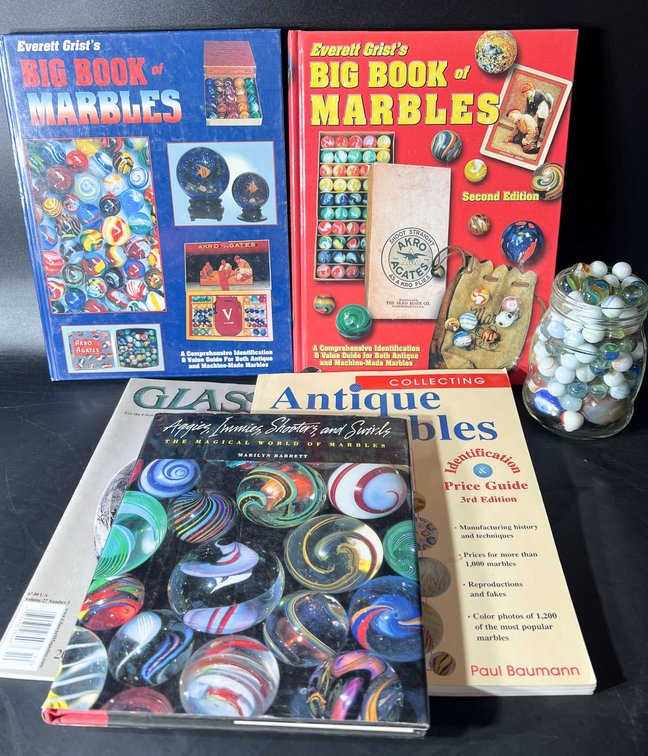 Marble Collectors’ Books and Jar of Assorted Marbles