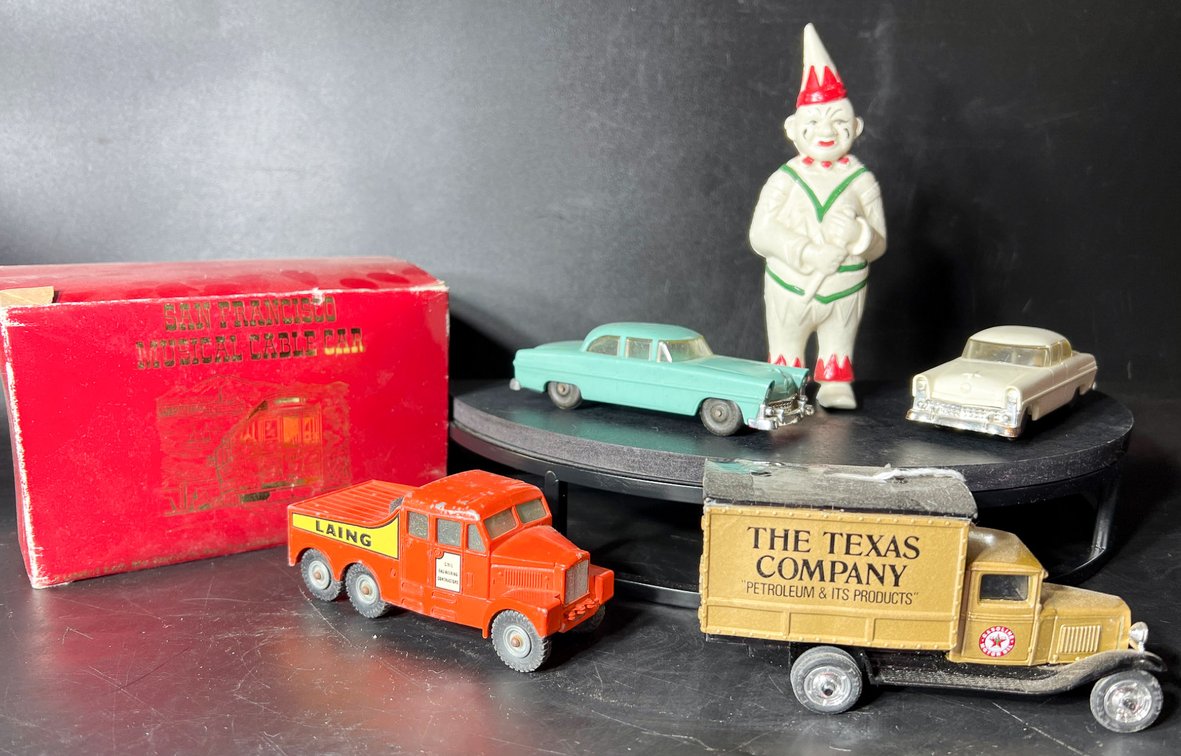 Die-Cast Vehicles, Cast Iron Clown Bank, and San Francisco Cable Car