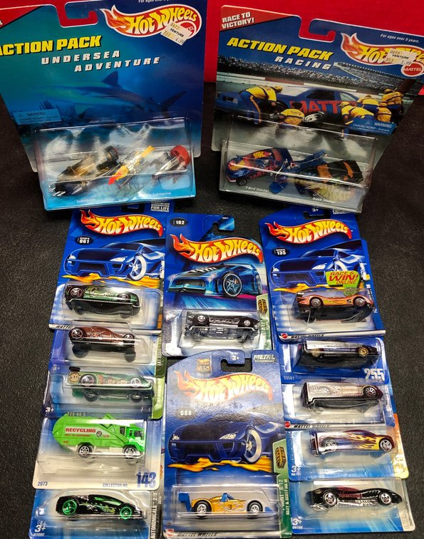 Hot Wheels Lot with 10 Cars, 2 Treasure Hunts, and 2 Action Packs