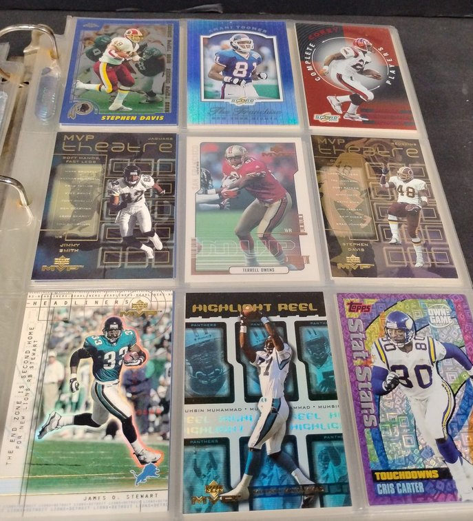 Binder Containing Mixed Sports Trading Cards Including Football and Baseball