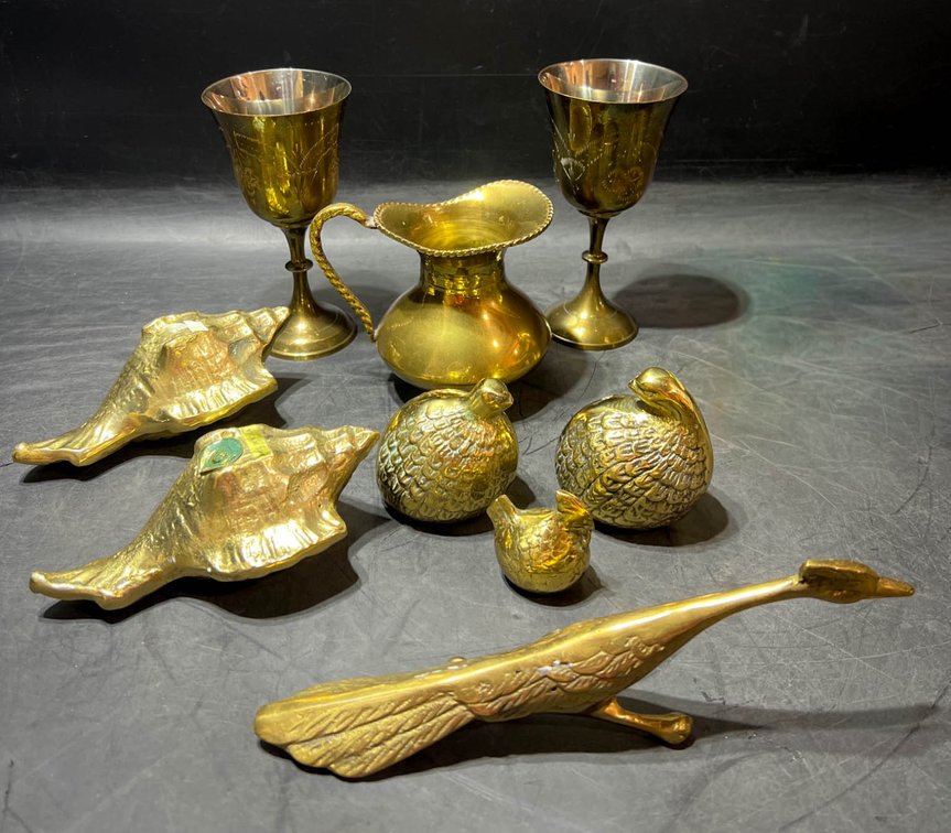Brass Decorative Items Including Animals, Goblets, and Pitcher