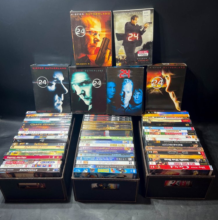 Over 50 DVDs Including TV Series and Movies