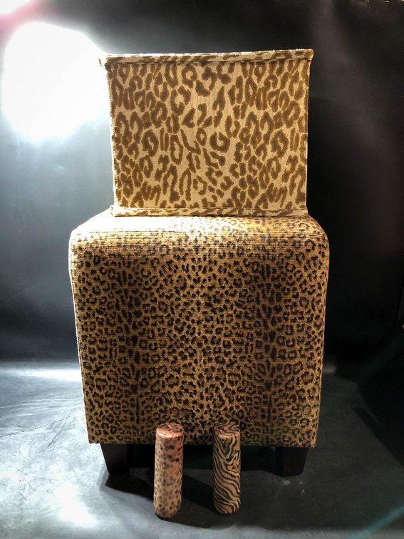Animal Print Ottoman and Pair of Animal Print Candles