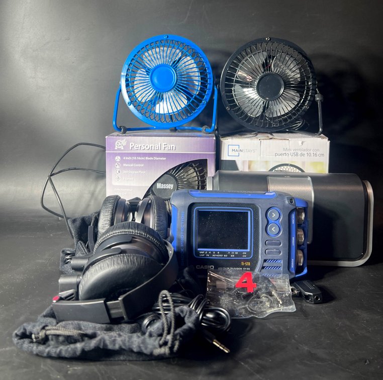 Electronics Including USB Fans, Casio TI-51M, Sony Headphones, and Energizer Charger
