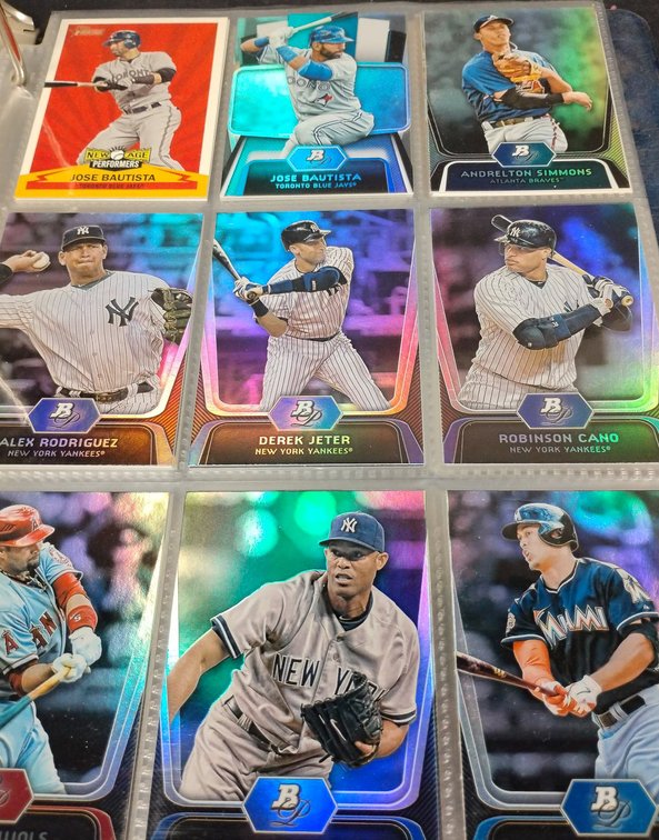 Foil and Holographic Football and Baseball Cards in Binder