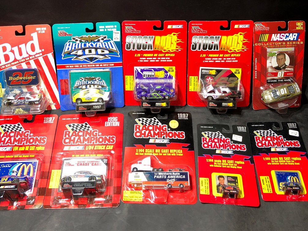 10 Racing Champions and NASCAR Die-Cast Cars in Original Packaging