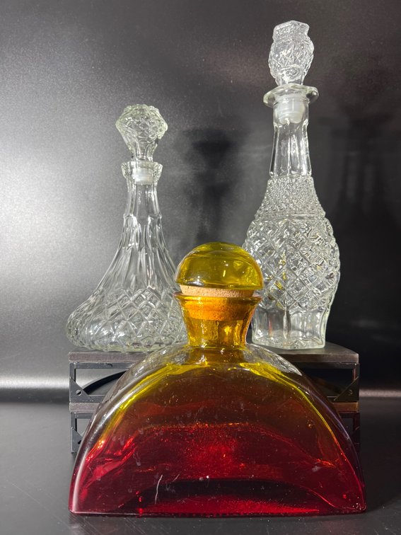 Three Decorative Glass Decanters with Stoppers