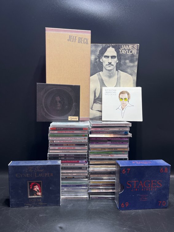 Music CDs and Boxed Sets, Including Jimi Hendrix, Cyndi Lauper, and James Taylor