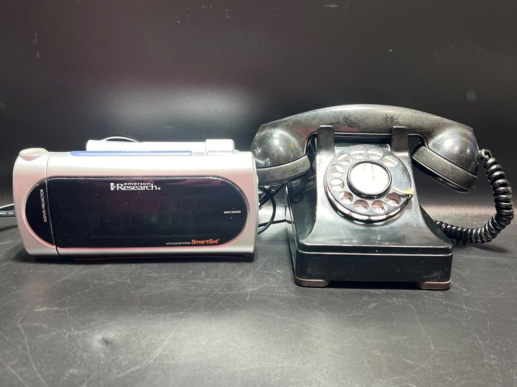 Vintage Rotary Telephone and Emerson Research Digital SmartSet Clock Radio