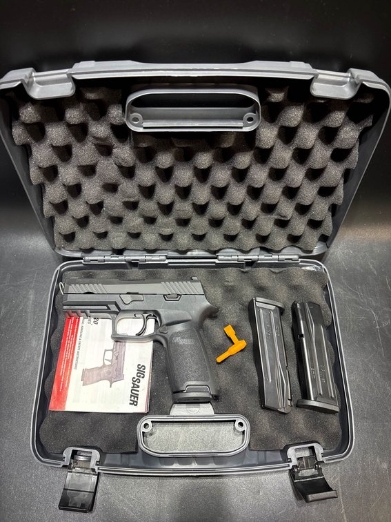Sig Sauer P320 9mm Pistol with Case and Accessories