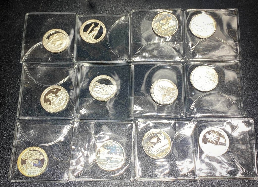 12 U.S. Quarter Coins Featuring Various Designs