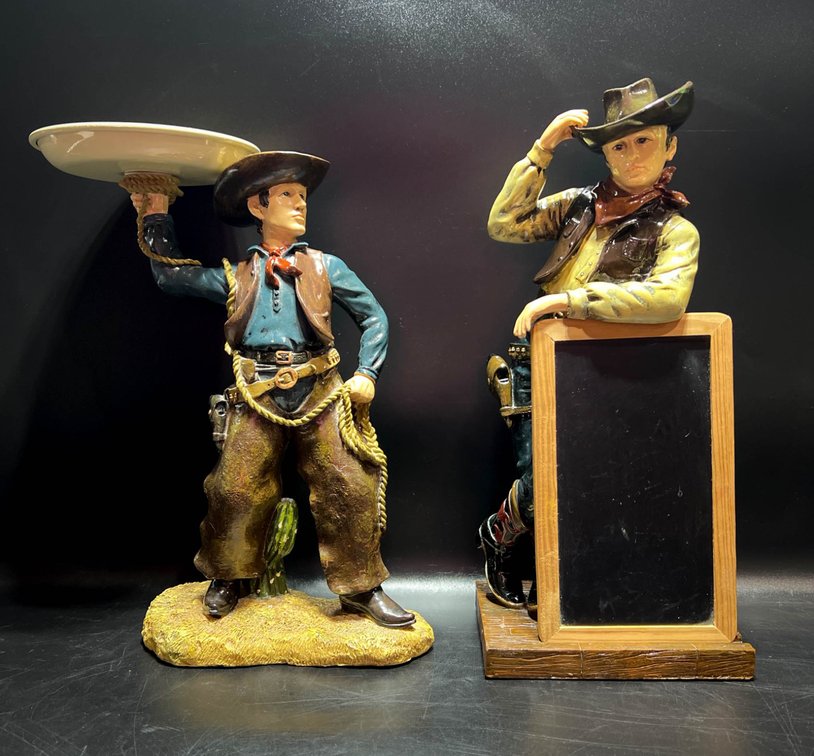 Two Cowboy-Themed Decorative Figures with Accessories