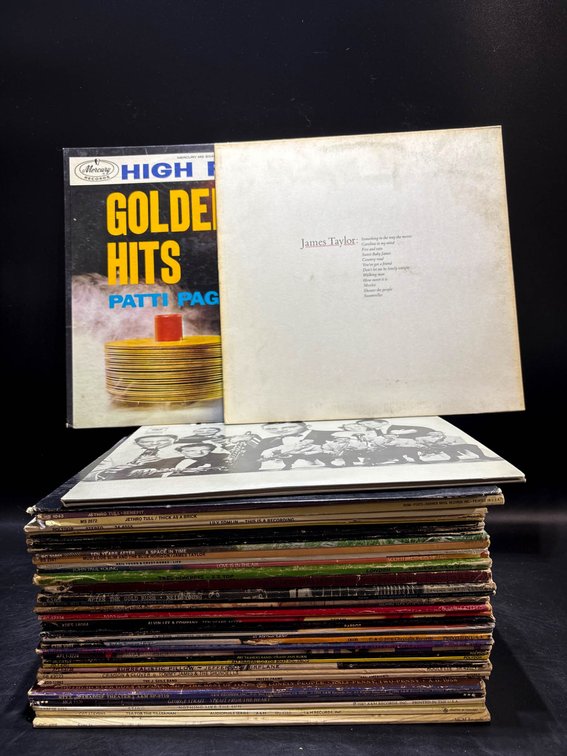 About 40 Vinyl Records