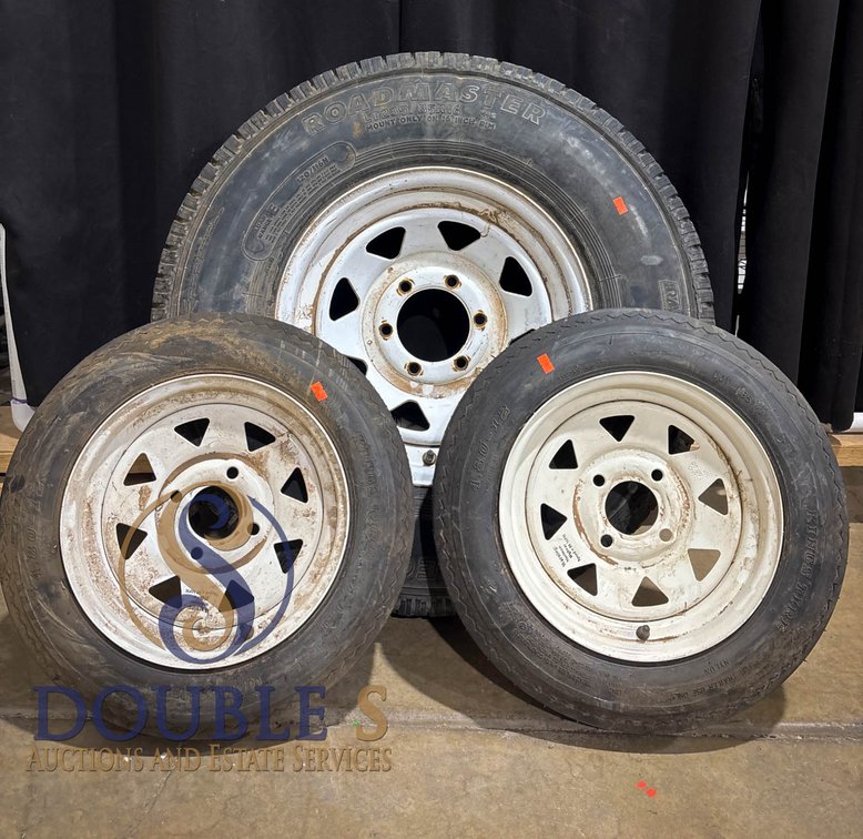 Three Tires with Mounted White Steel Wheels, Various Sizes