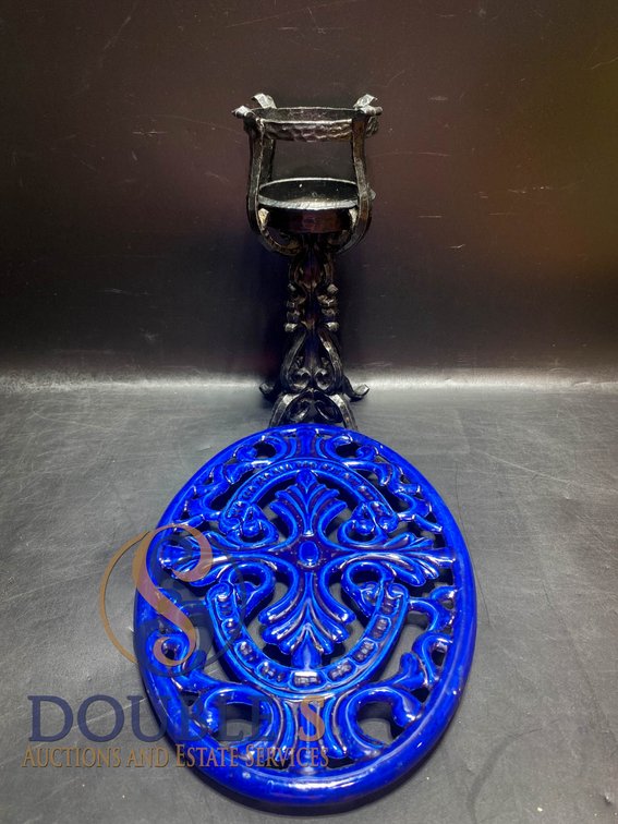 Cast Iron Stand and Decorative Blue Trivet with Scroll Pattern