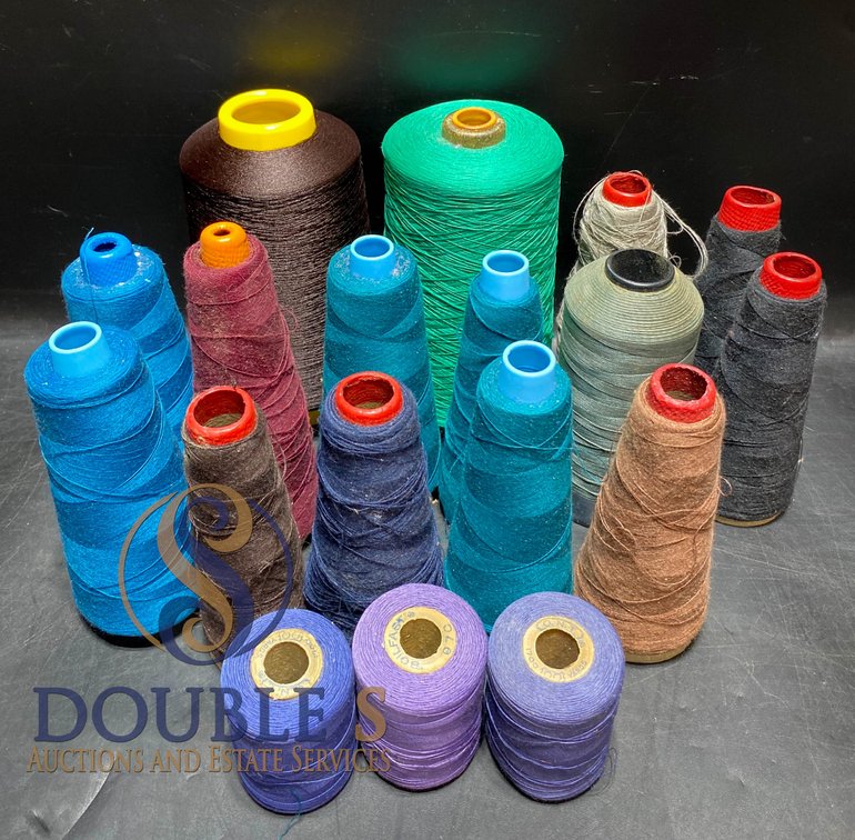 Spools of Thread in Various Colors and Sizes
