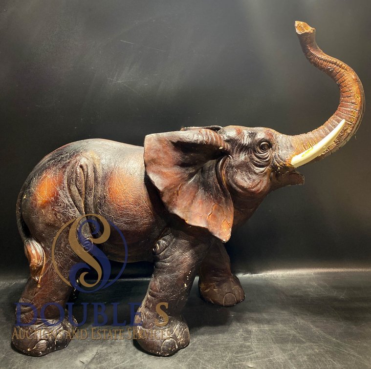 Brown Resin Elephant Figurine with Raised Trunk