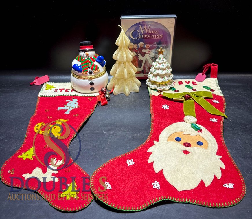 Christmas Decor Lot Including Stockings, Figurines, Candles, and DVD