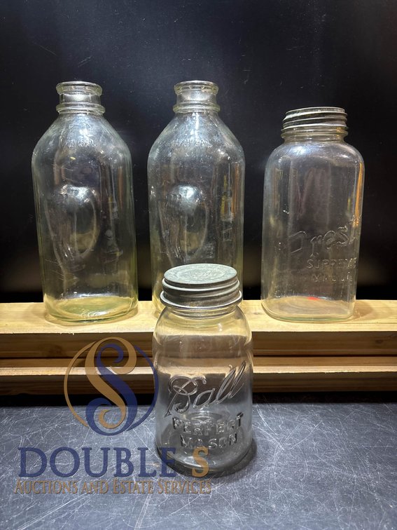 Four Clear Glass Bottles Including Ball and Presto Mason Jars