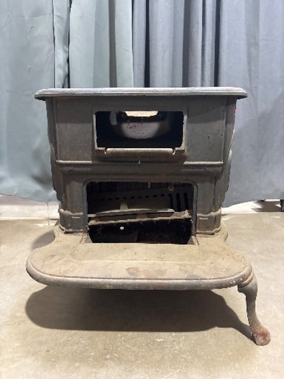 Cast Iron Wood Stove with Dual Burner Plates and Footed Base