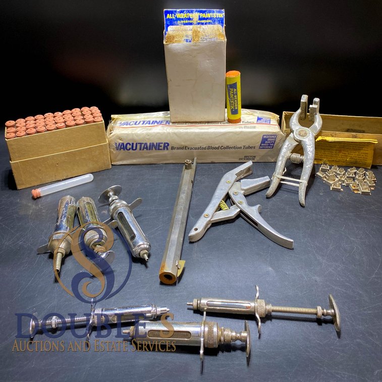 Medical and Veterinary Equipment with Syringes, Tools, and Vacutainers