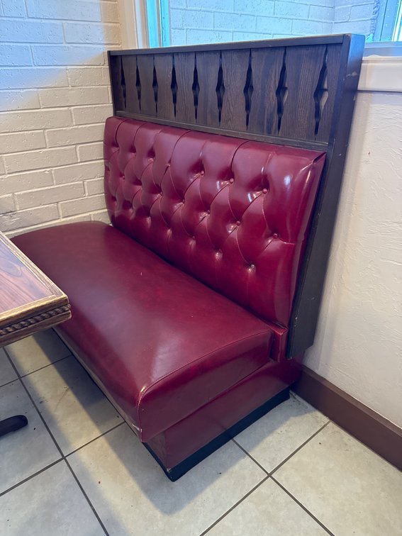 Red Tufted Vinyl Restaurant Booth with Dark Wood Backrest