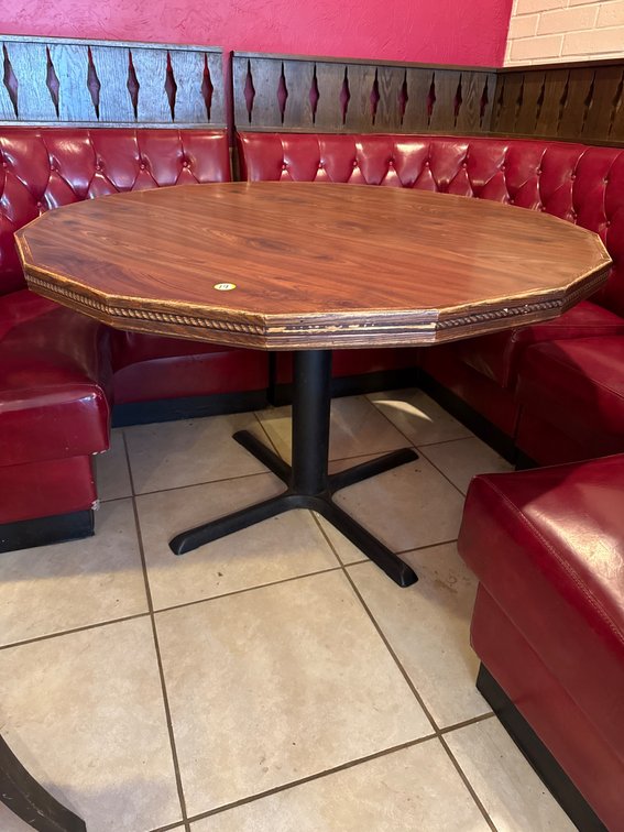 Round Table with Decorative Corners on Pedestal Base