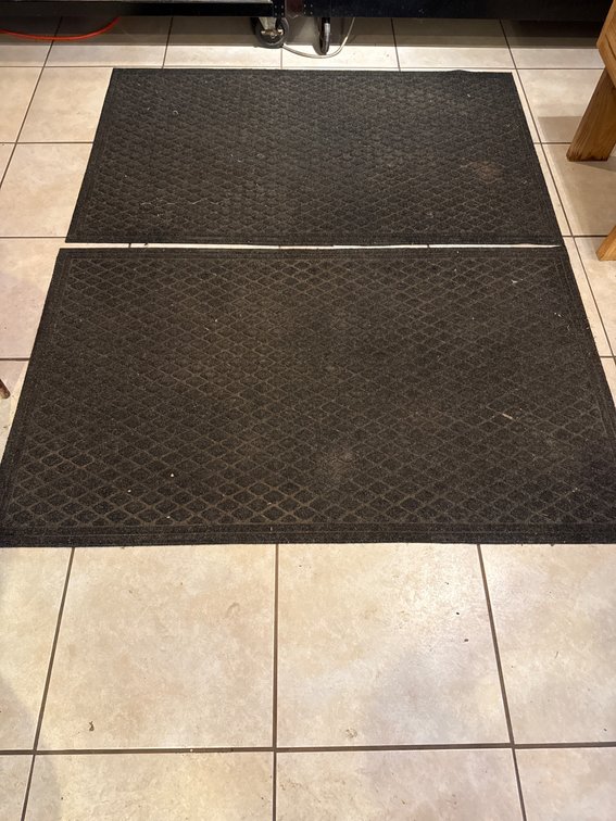 2 Black Floor Mats with Diamond Grid Pattern
