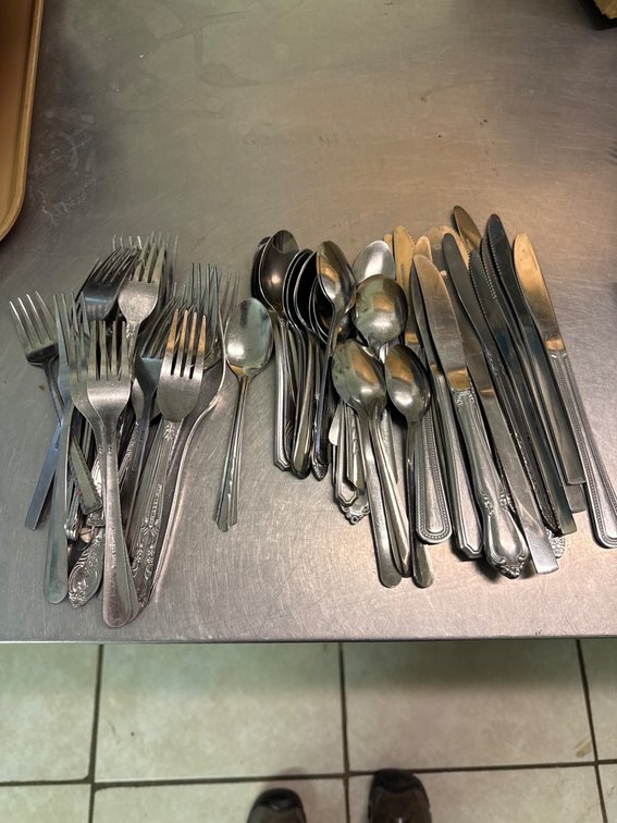 20 Forks, Spoons, and Butter Knives in Mixed Designs