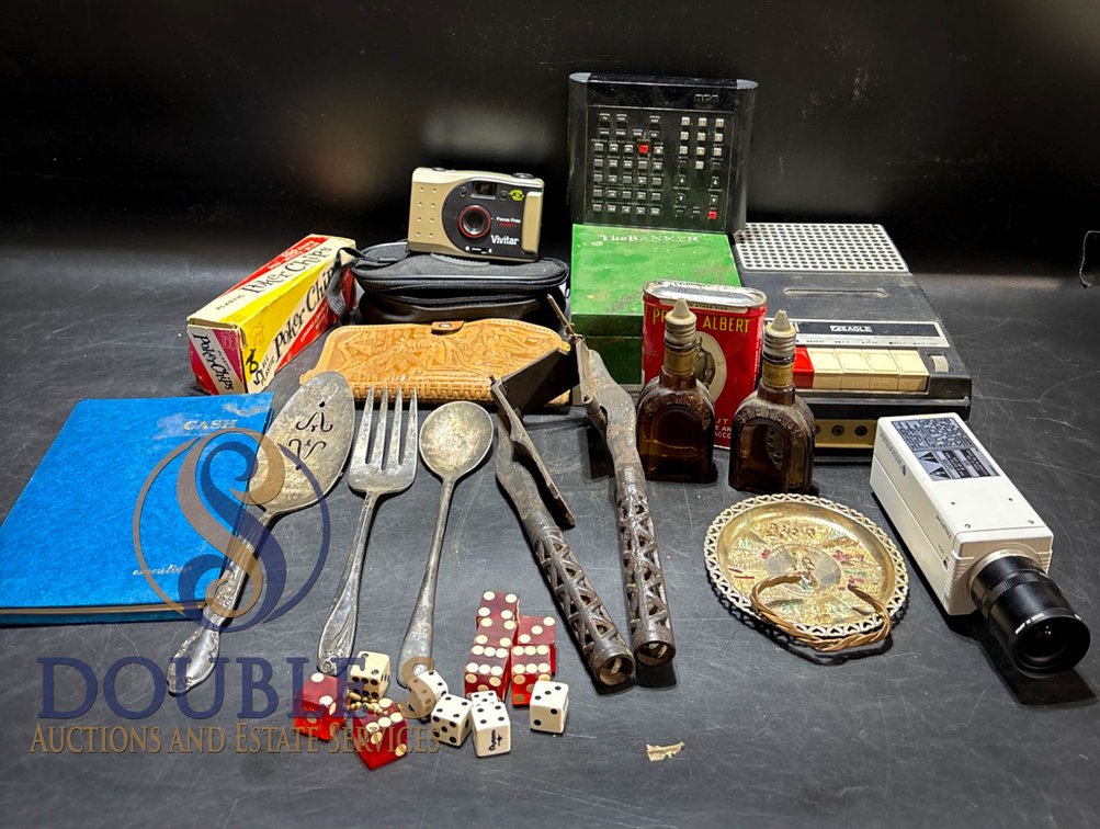 Vintage Items Including Dice, Utensils, and Electronics