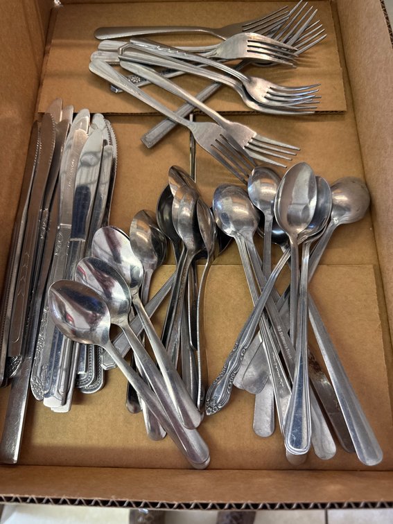 Stainless Steel Flatware Set Including Knives, Forks, and Spoons