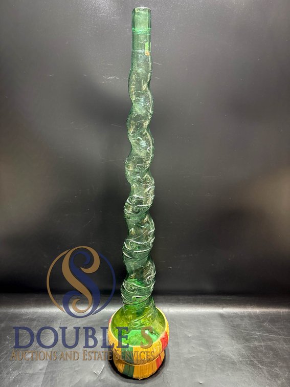 Green Twisted Glass Bottle with Multicolored Woven Base, 36 Inches Tall