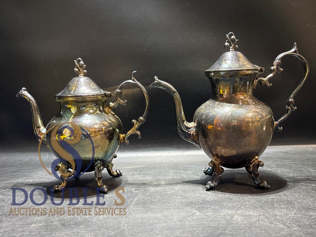 Silver-Plated Coffee and Tea Set with Ornate Handles and Floral Finials